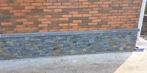 Каменный цоколь у дома фото 3D панели RKS SLATE Сланец Dark Multicolor Modern (1)